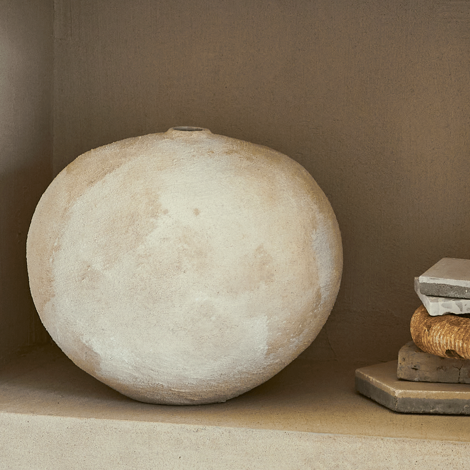Round earthenware vase